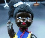 small black hp doll yellow face